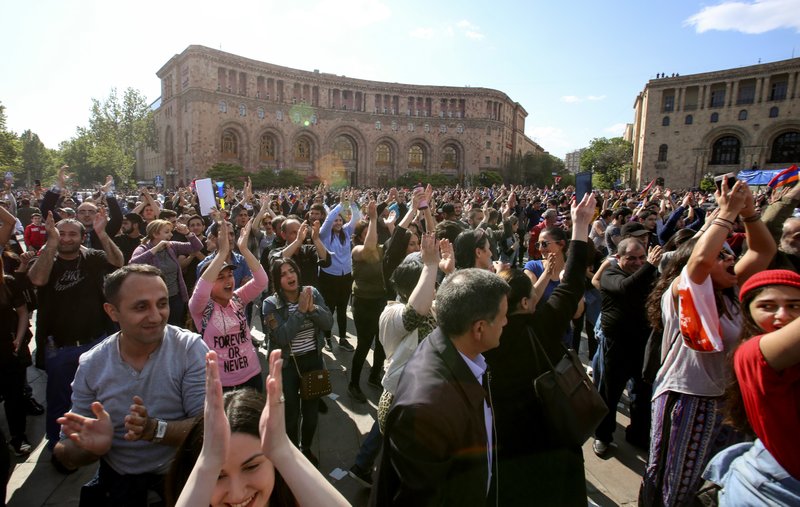 People celebrate Armenian Prime Minister’s Serzh Sargsyan’s resignation in Republic Square in Yerevan, Armenia, Monday, April 23, 2018.