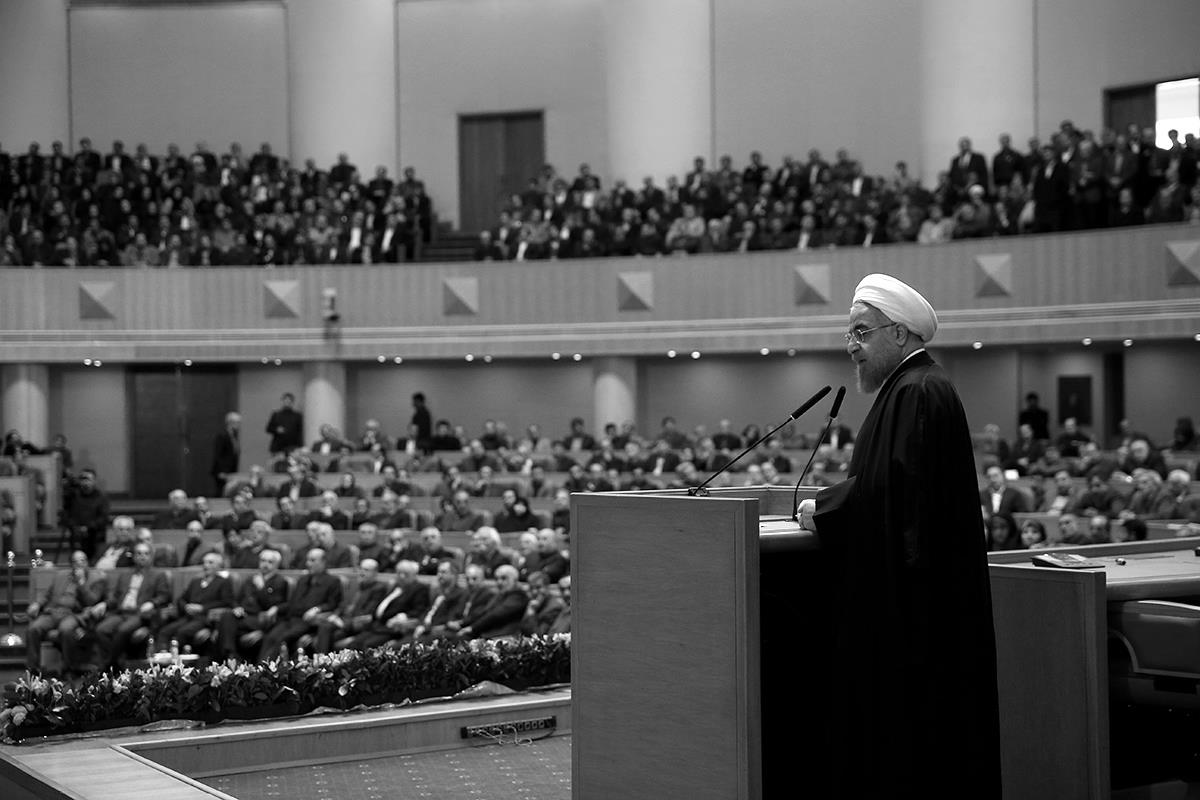 A handout picture provided by the office of Iranian President Hassan Rouhani shows him delivering a speech during a conference entitled “Implementation of Joint Comprehensive Plan of Action (JCPOA) a new chapter in Iran’s economy”, on January 19, 2016, in Tehran. 