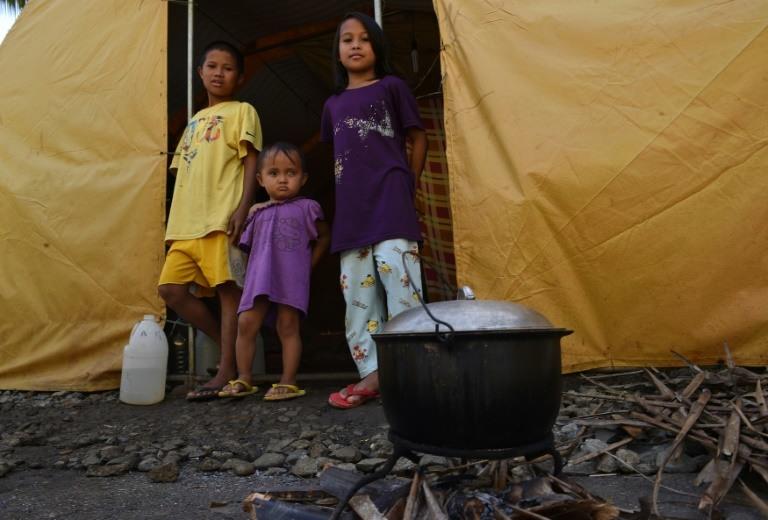 Tens of thousands of people have been forced to live in makeshift evacuation centres