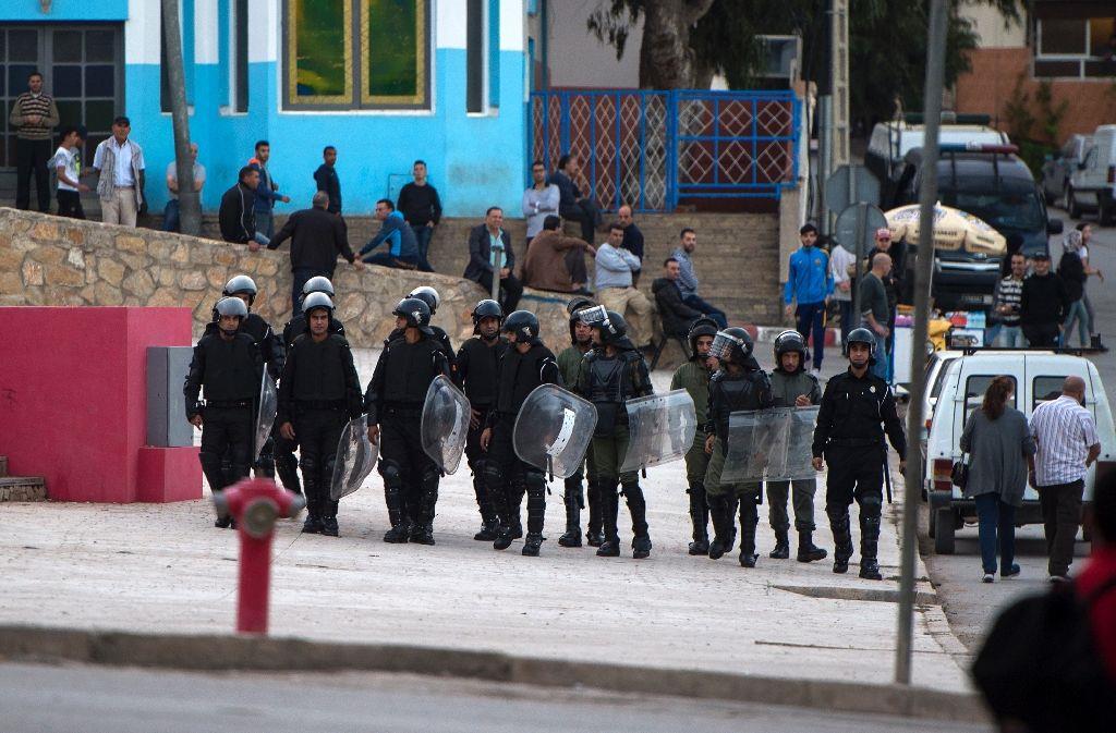 Moroccan police search for protestors from Morocco's al-Hirak al-Shaabi movement as they