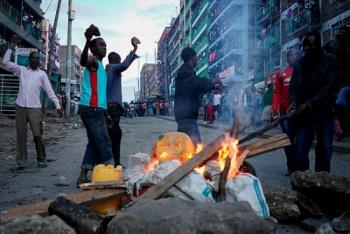 Opposition supporters set up a roadblock after the announcement of the re- election's result by Kenya's Independent Electoral and Boundaries Commission