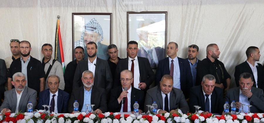 'We are here to turn the page on division, restore the national project to its correct direction and establish the (Palestinian) state,' Prime Minister Rami Hamdallah said.