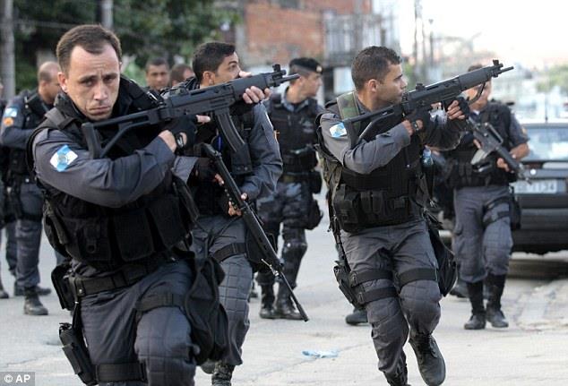  Police take position dPolice take position in what was the largest raid by Brazilian security forces