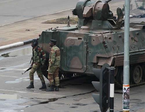 Zimbabwe's army seizes power, targets 'criminals' around Mugabe