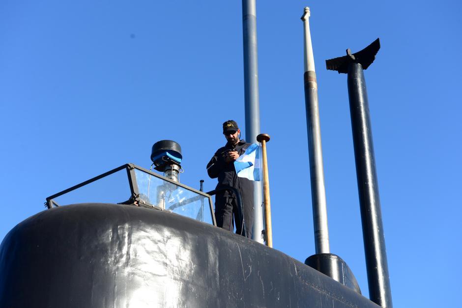 A crew member of the Argentine military submarine ARA San Juan stands on the vessel at the port of Buenos Aires, Argentina June 2, 2014