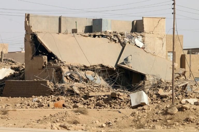 A damaged building in Rawa on November 18, 2017, after Iraqi forces retook the Euphrates valley town from Islamic State group jihadists