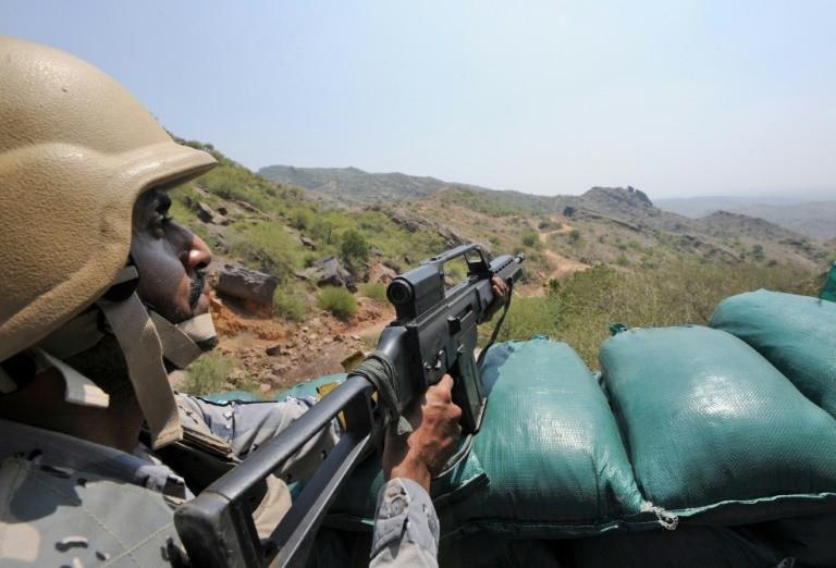 Saudi border guards keep watch along the border with Yemen in the al-Khubah area in the southern Jizan province