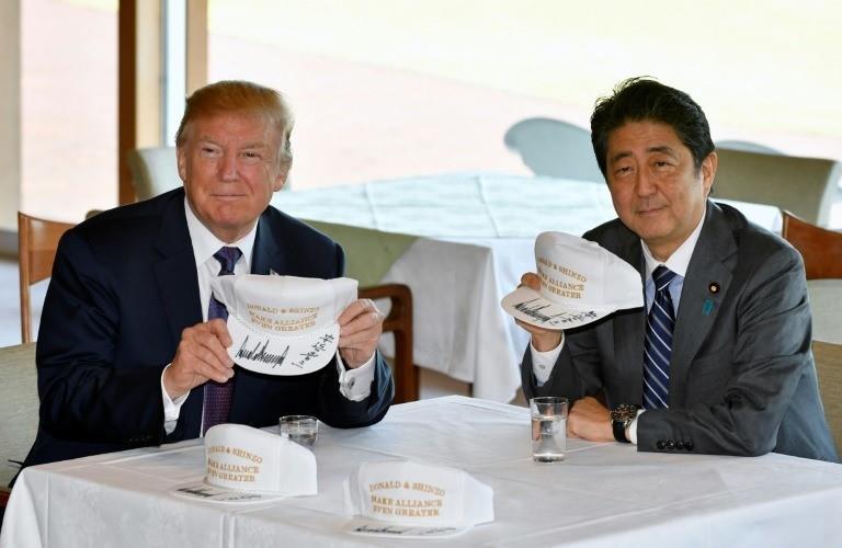 Trump and Abe signed caps for the occasion