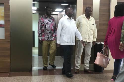 Zimbabwe's former president Robert Mugabe walks out of a lift at the Gleneagles Hospital in Singapore on Friday