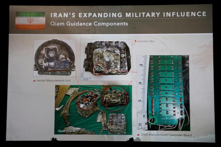 A placard shows parts of the guidance system to an Iranian Qiam Ballistic Missile on display