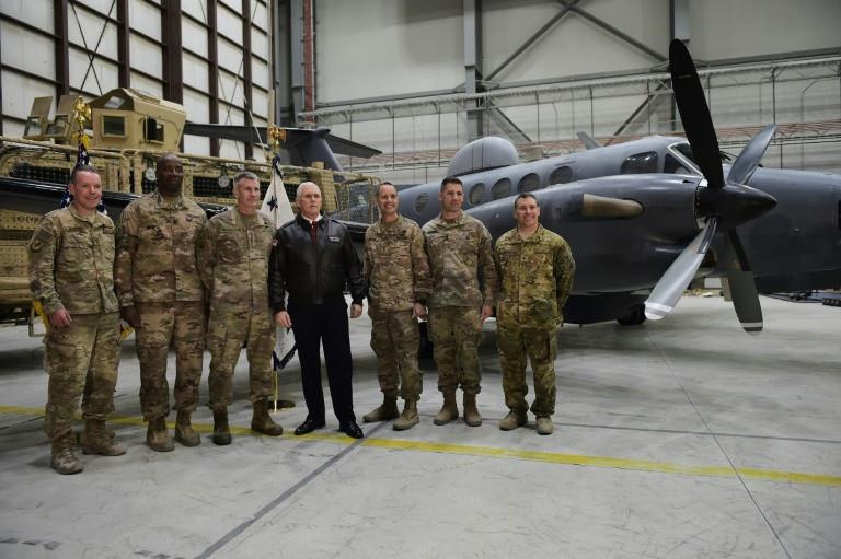 US Vice President Mike Pence poses with military leaders shortly after arriving at Bagram Air Field in Afghanistan on December 21, 2017