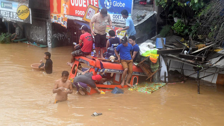 Footage shows vast tracks of land on the island is now under brown water.
