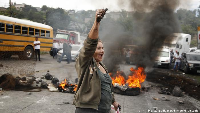 Anti-government protesters have taken to the streets to demand a recount of the vote. File Photo