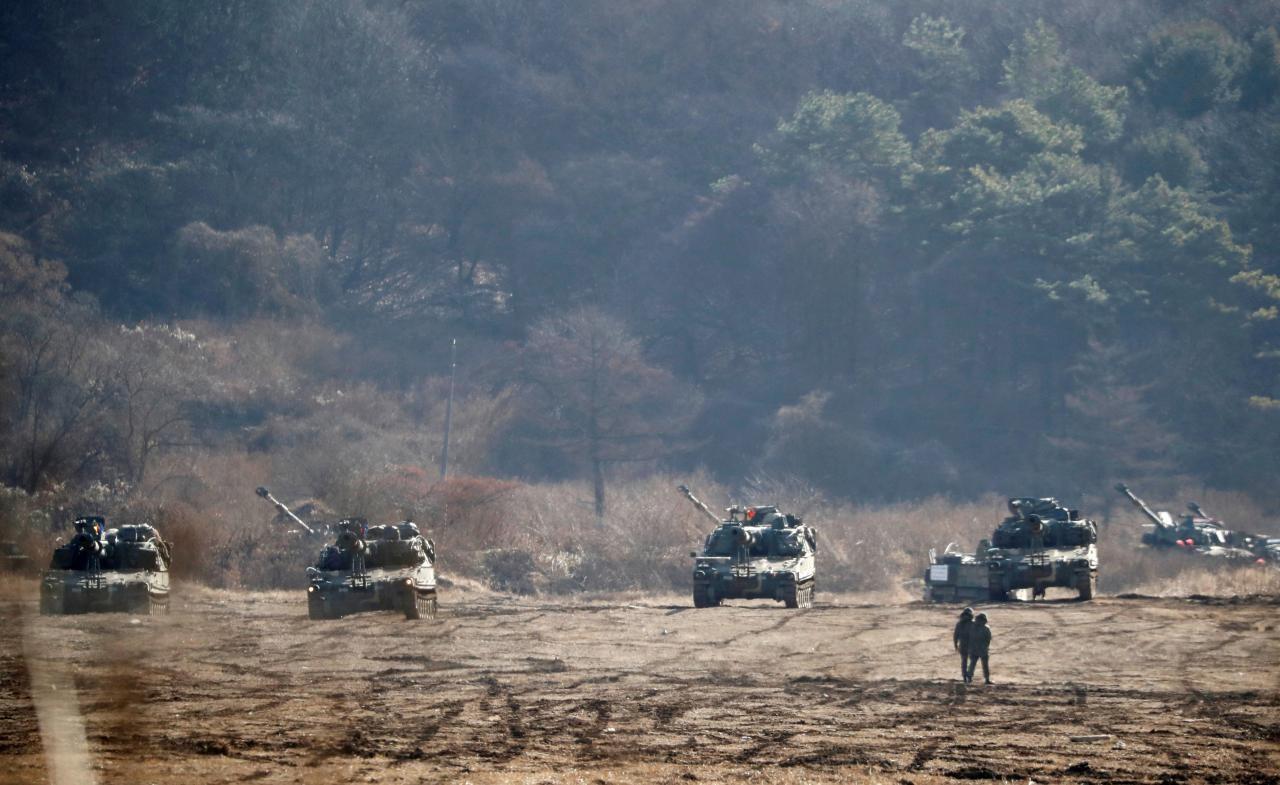 The South Korean army's K-55 self-propelled artillery vehicles take part in a military exercise near the demilitarised zone separating the two Koreas in Paju, South Korea, November 29, 2017.