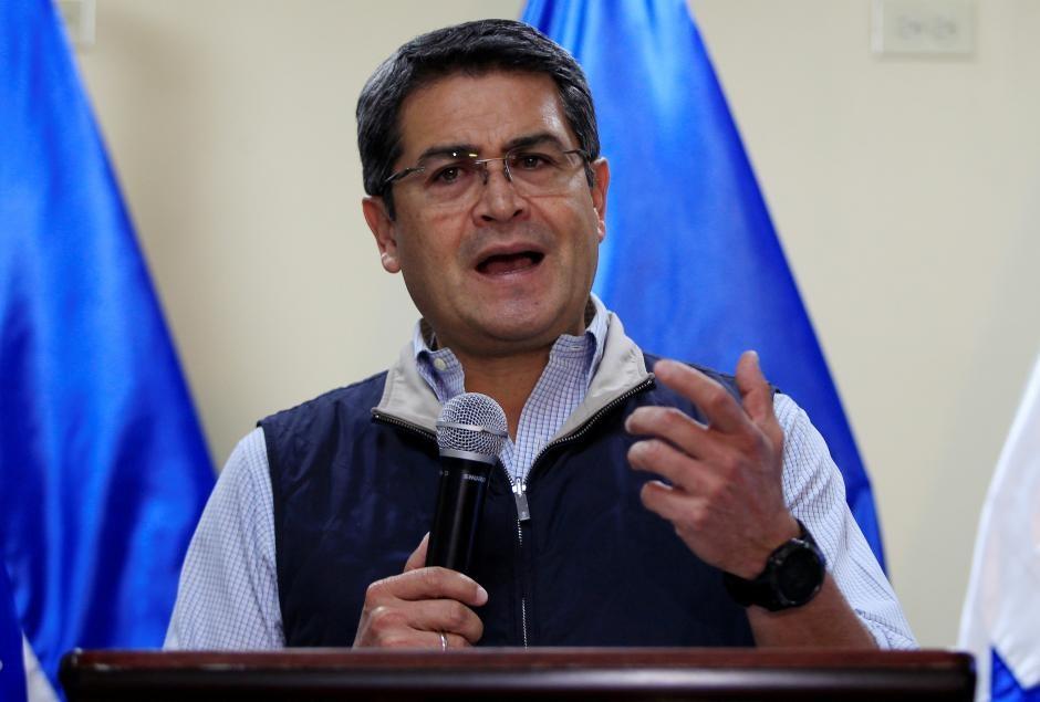 Honduras President and National Party candidate Juan Orlando Hernandez gestures as he addresses the media at the Presidential House in Tegucigalpa, Honduras December 5, 2017