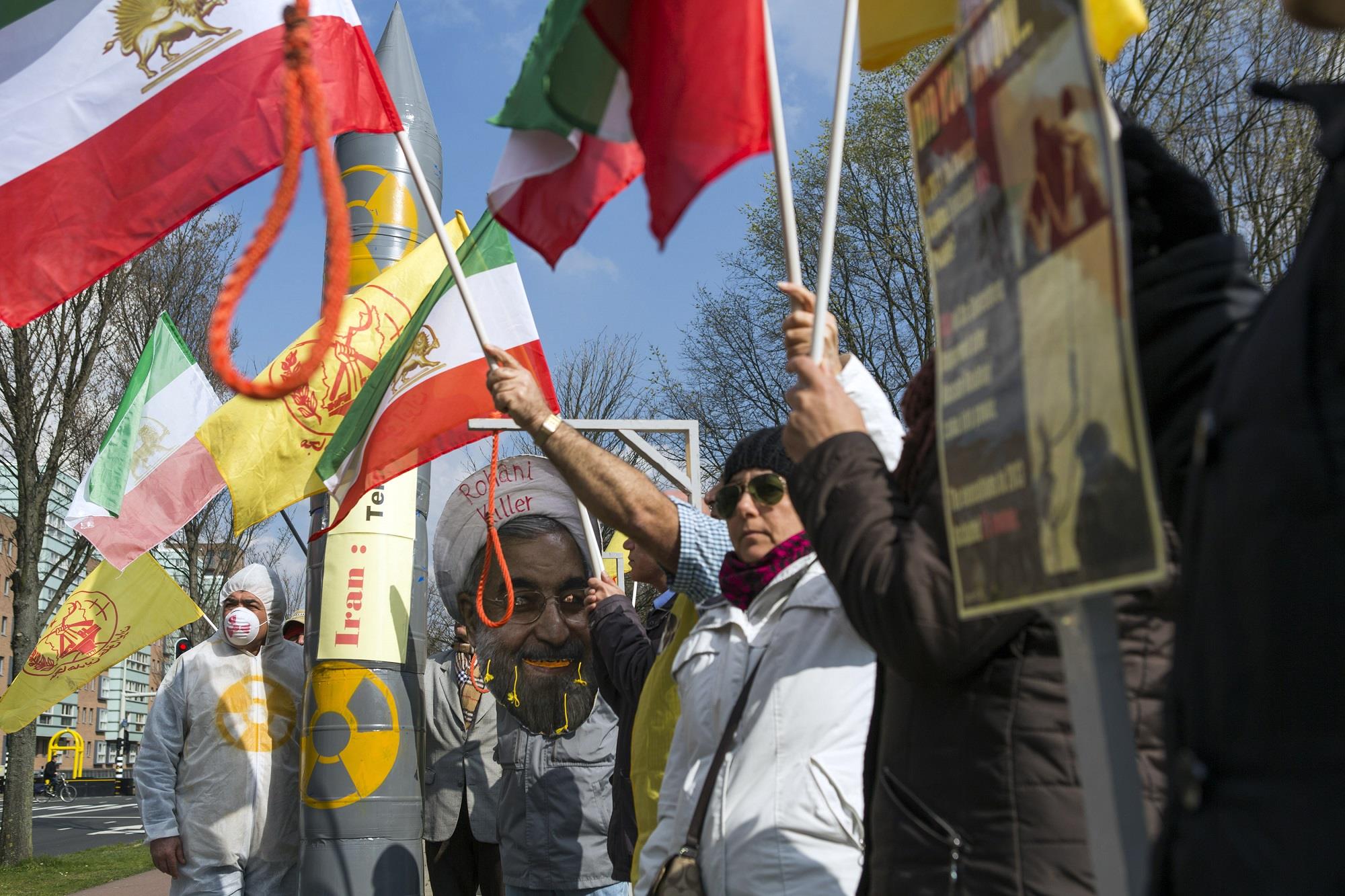 People protest against executions and human rights violations in Iran on a square near the Nuclear Security Summit in The Hague March 25, 2014.