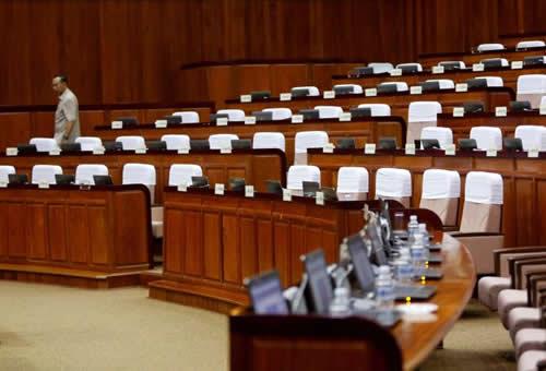 A man prepares at the National Assembly of Cambodia