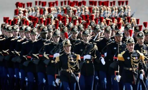 Members of the French Republican Guard march as they arrive for the traditional Bastille day military parade on the Champs-Elysees in Paris, France, July 14, 2017