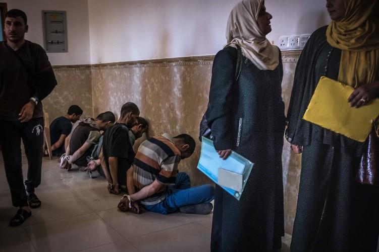 Men suspected of fighting for the Islamic State, detained in a makeshift courthouse in Qaraqosh, near Mosul. 