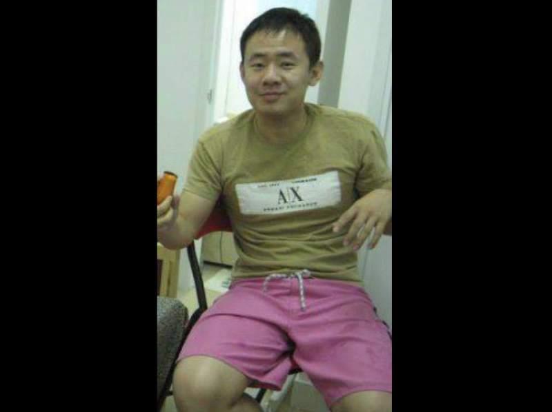 This 2009 handout photo released by a friend of Xiyue Wang, shows Xiyue Wang at his apartment in Hong Kong, China. Princeton University professor ...
