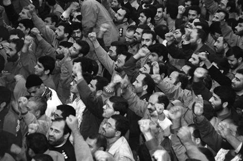 Members of the IRGC cheer during the speech of Iran’s Supreme Leader Ali Khamenei on the occasion of IRGC Week in Tehran 13 November 1999