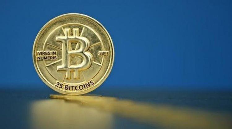 Bitcoin (virtual currency) coins are seen in an illustration picture taken at La Maison du Bitcoin in Paris, France