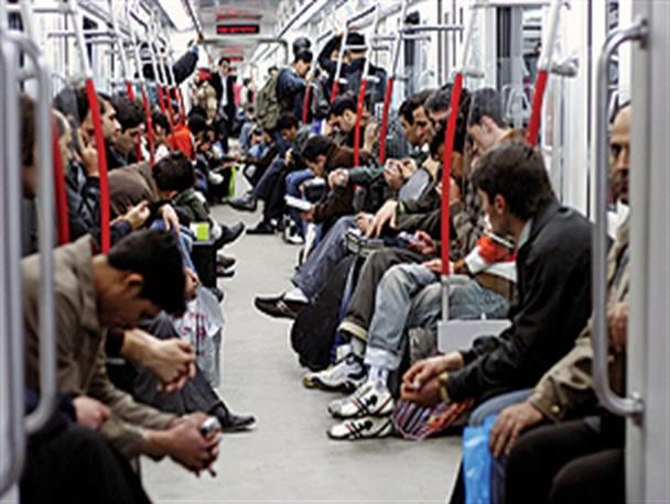 Passengers are seen in the metro