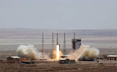 A handout picture released by Iran’s Defense Ministry on July 27, 2017 shows a Simorgh (Phoenix) satellite rocket at its launch site at an undisclosed location in Iran. 