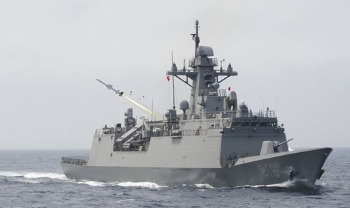 a South Korean navy ship fires a missile 