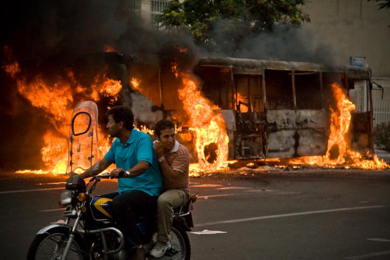 A bus burning in Tehran, the result of protests during the 2009 uprisings