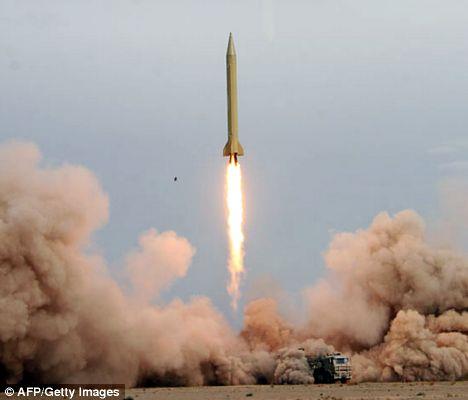  An Iranian Shahab-3 missile: The long-ranged ballistic missle rises into the air after being test-fired at an undisclosed location in the Iranian desert