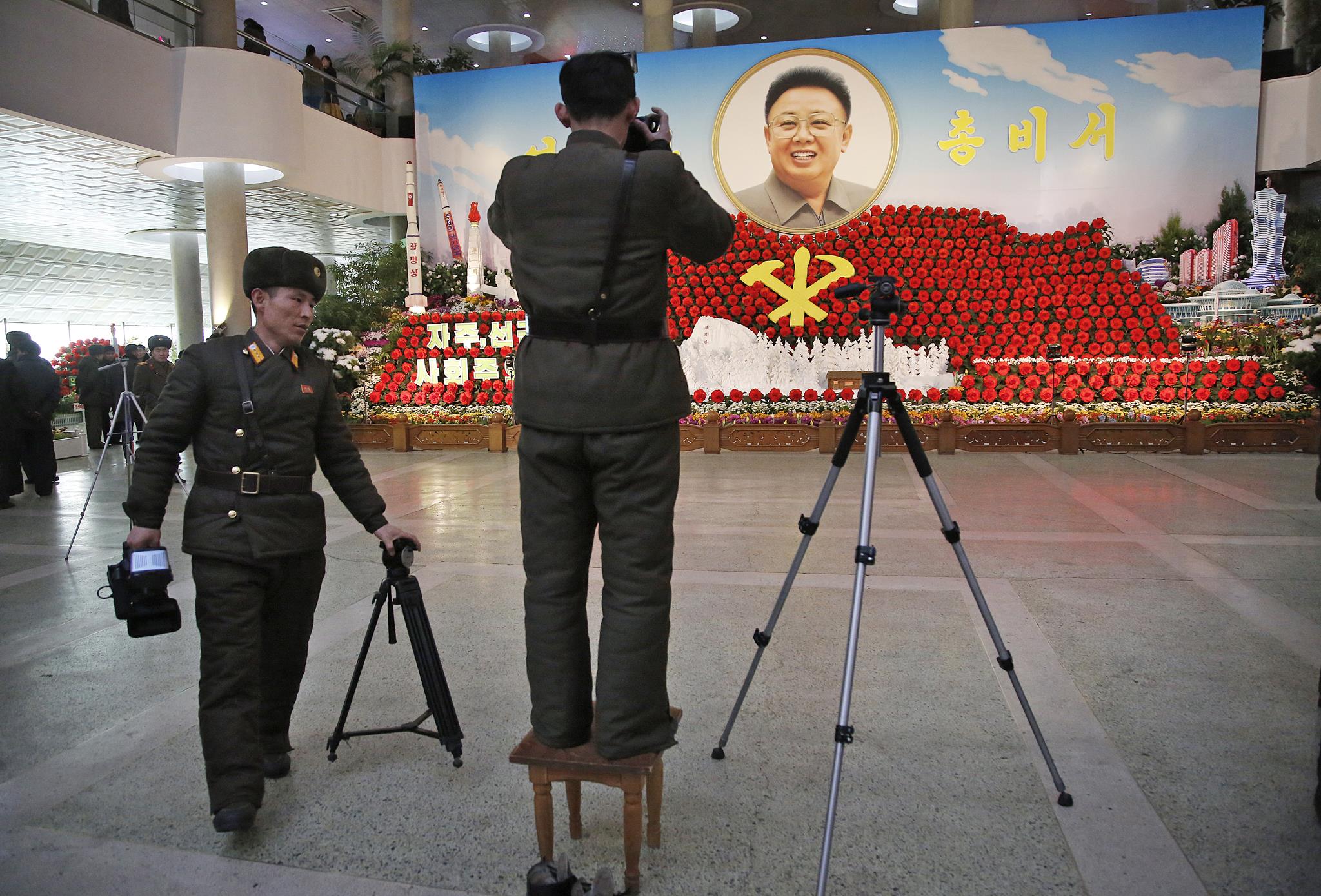 North Korea leader holds off on Guam missile plan; Seoul will prevent war