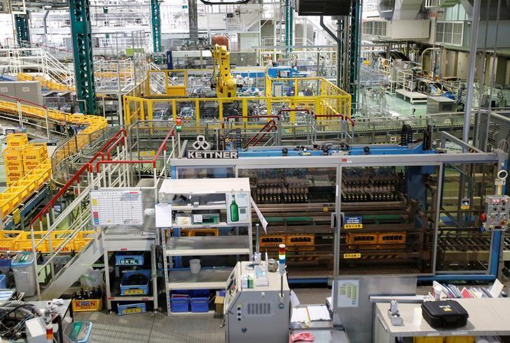 A production line of beer is pictured at Japanese brewer Kirin Holdings' factory in Toride, Ibaraki Prefecture, Japan July 14