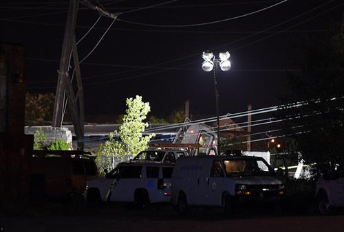  The back of a derailed train carriage is seen in Philadelphia as officials continue their search for possible passengers still caught in the wreckage