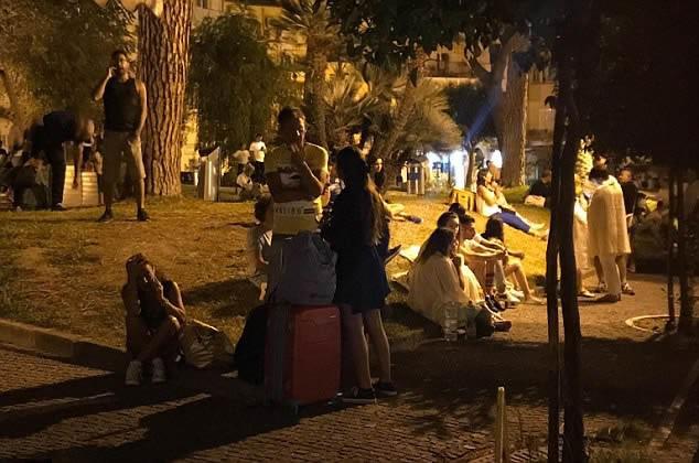  Locals and tourists were forced to wait in the street after the earthquake hit the island just off the coast of Italy