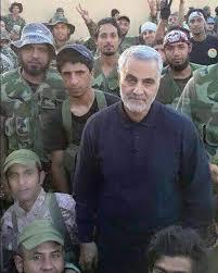Qasem Suleimani Iranian commonder of the Quds Force , He is shown with Iraqi militia fighters in Aleppo