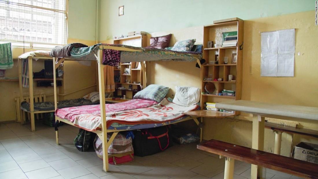 X5 shares a cell with 8 other convicts, and sleeps in a double bunk bed.