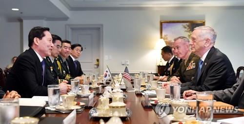 In this photo provided by South Korea's Ministry of National Defense, South Korean Defense Minister Song Young-moo (L) and U.S. Defense Secretary Jim Mattis (R) hold talks at the Pentagon near Washington on Aug. 30, 2017