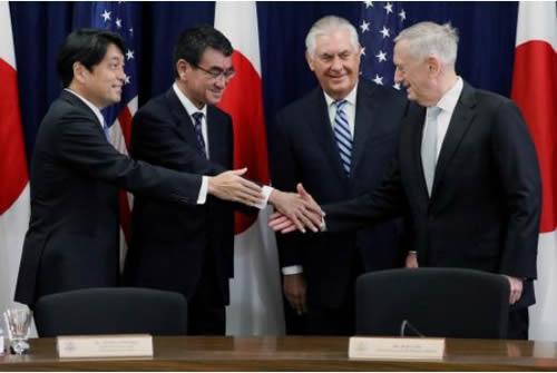  (L-R) Japan's Defense Minister Itsunori Onodera and Foreign Minister Taro Kono shake hands with U.S. Secretary of State Rex Tillerson and Defense Secretary James Mattis before sitting down for U.S.-Japan Security talks at the State Department in Washington, U.S. August 17, 2017