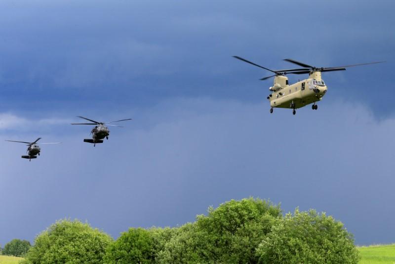 U.S. CH-47 Chinook and Black Hawk helicopters take part in Suwalki gap defence exercise in Mikyciai, Lithuania, June 17, 2017