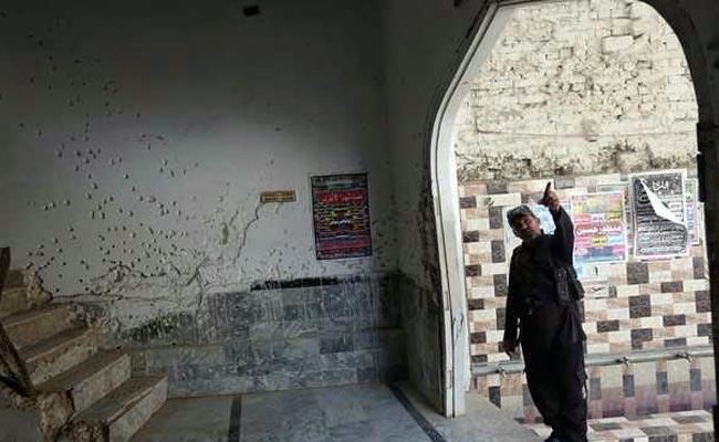  A general view of a wall with shrapnel-scars, which witnesses said was damaged in a suicide blast on January 2015, in a Shi'ite mosque in Shikarpur, Pakistan March 19, 2017. Picture taken March 19, 2017.