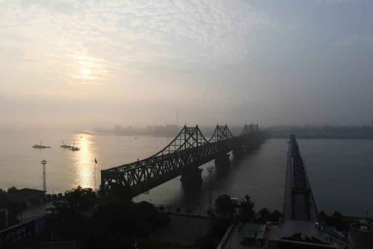 The Friendship Bridge that connects Sinuiju and the the Chinese city of Dandong, is the conduit for much of the trade between North Korea and China