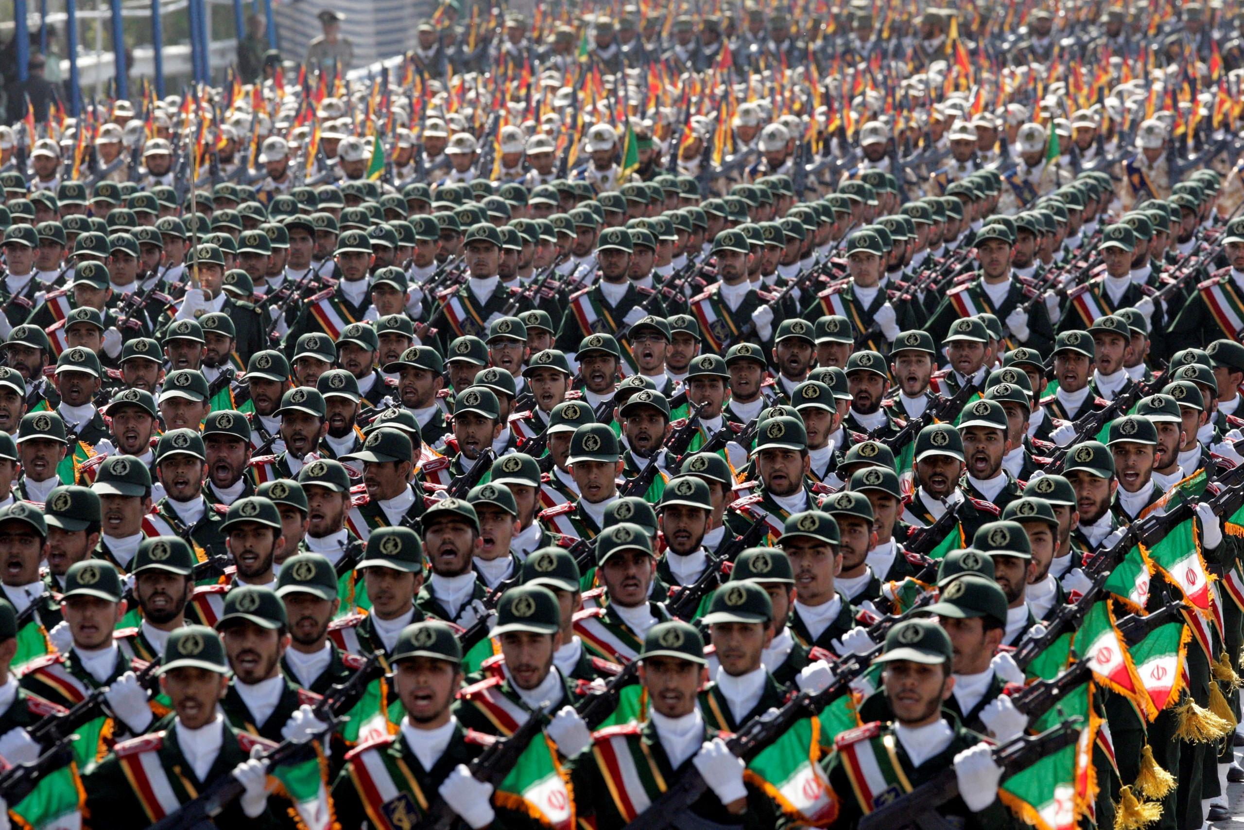 Iran’s Revolutionary Guard troops march, during a military parade commemorating the start of the Iraq-Iran war 32 years ago