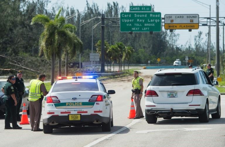  A police checkpoint on US Highway 1 blocks access to the Florida Keys following Hurricane Irma