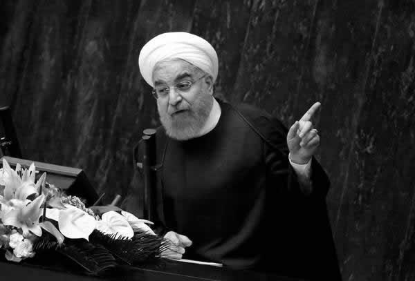 Image: Iranian President Hassan Rouhani addresses a parliamentary session in Tehran