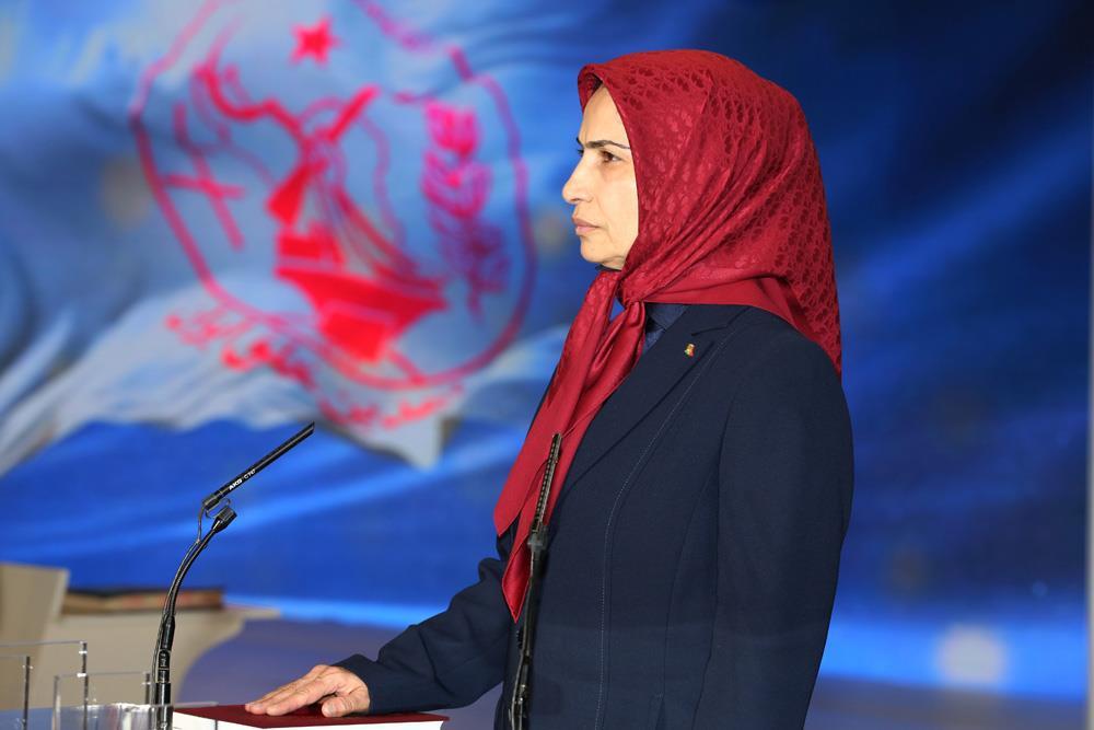 Zahra Merrikhi, the new PMOI Secretary General pledging an oath to the Holy Quran.