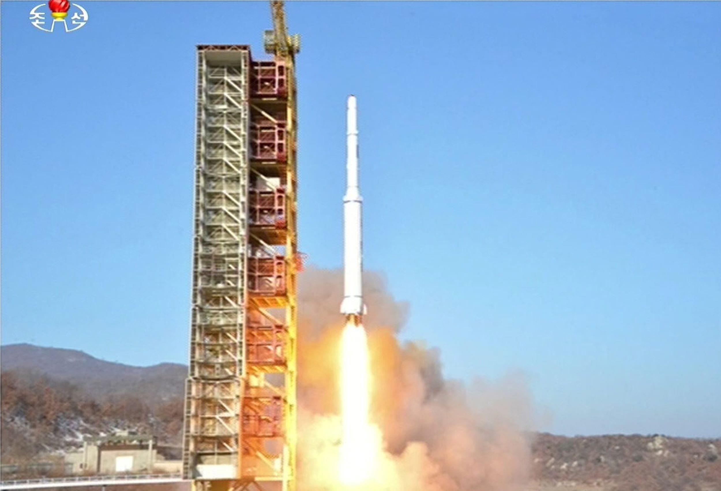 A North Korean rocket lifts off from its launchpad in Dongchang-ri Sunday morning