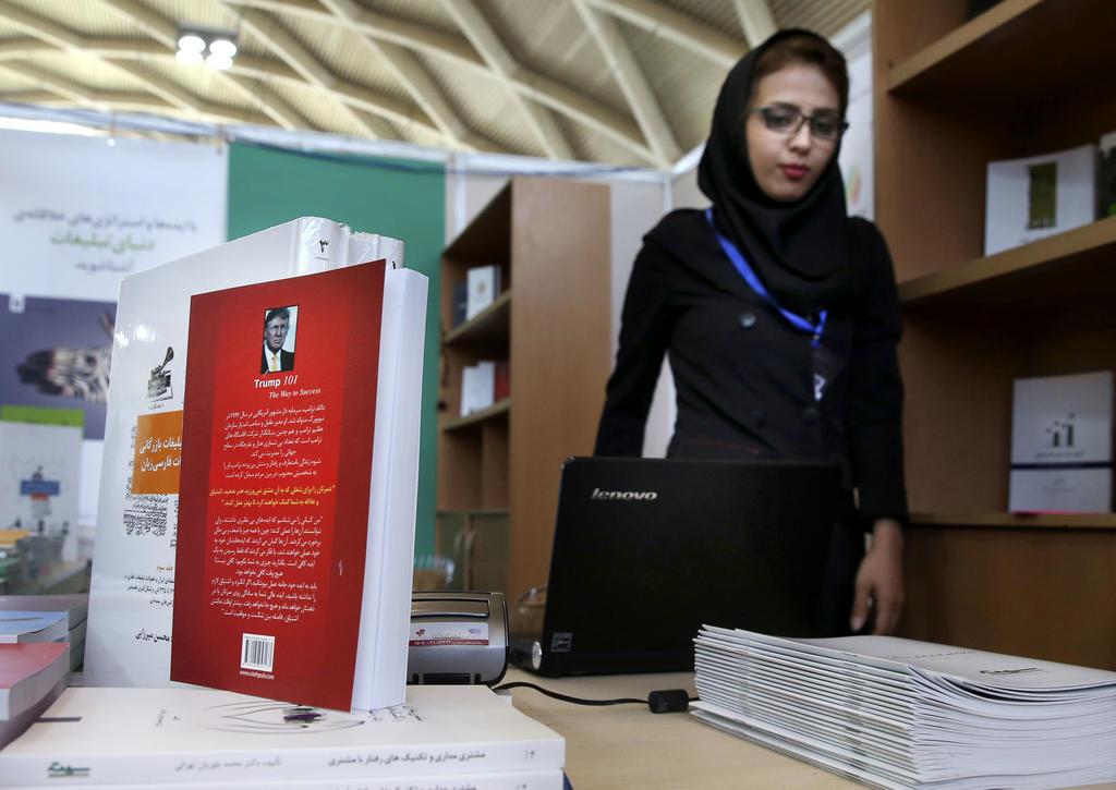 This picture taken on May 10, 2016 shows, US presidential candidate Donald Trump’s book “Trump 101: The Way To Success” translated to Persian on display during Tehran’s International Book Fair in Iran. 
