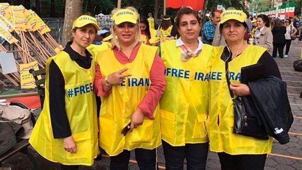 Protestors affiliated with the National Council of Resistance to Iran push for an overthrow of the Rouhani-led regime outside the United Nations on Wednesday
