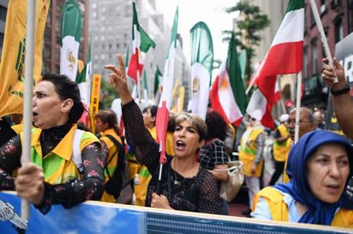 Demonstrators protested against President Hassan Rouhani of Iran near the United Nations headquarters in New York on Tuesday. Mr. Rouhani addressed the General Assembly on Wednesday